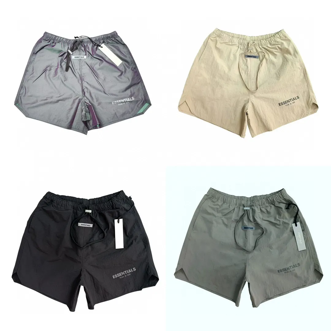 🎀Hot Sale model picture🎀80 [Charcoal Gray] The top version of FOG ESSENTIALS FEAR OF GOD Season 7 multi-line high street 3M reflective waterproof nylon woven shorts. The custom-made fabric is soft and the color is correct. It is comfortable to wear and not stiff. Black blue light and green are not dark or light and just right. The color is imported 3M glue with strong reflectivity. The pocket seams are dense and detailed. The drawstrings are dyed with no color difference. The bag edges are all embroidered. No cutting corners. The three tags are complete. Size：S-XL